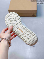 Underside of a Terrex shoe showing its lugged outsole