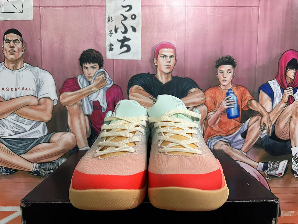 Front view of the lace-up basketball shoes with cream laces, coral toe accents, and gum-colored outsoles.