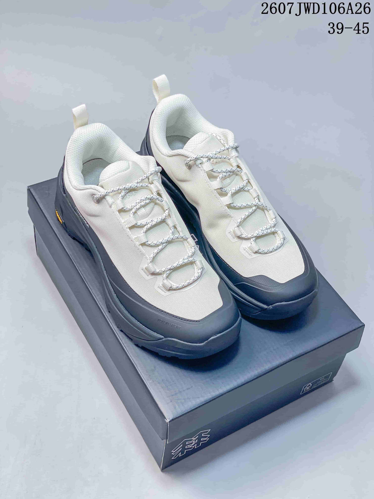 Cream and black KOLON SPORT hiking shoes displayed on a shoebox, with source text showing 2607JWD106A26 and sizes 39–45.