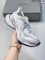 White and silver-gray mesh sneaker with a chunky sole