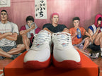Front view of white Nike GT Cut 3 basketball shoes with red outsole accents.
