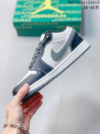 Side profile showing the grey Swoosh, contrasting panels, white midsole and dark outsole.