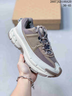 Angled side view highlighting the layered upper, Nike side branding, contrasting toe detail, and chunky sole.