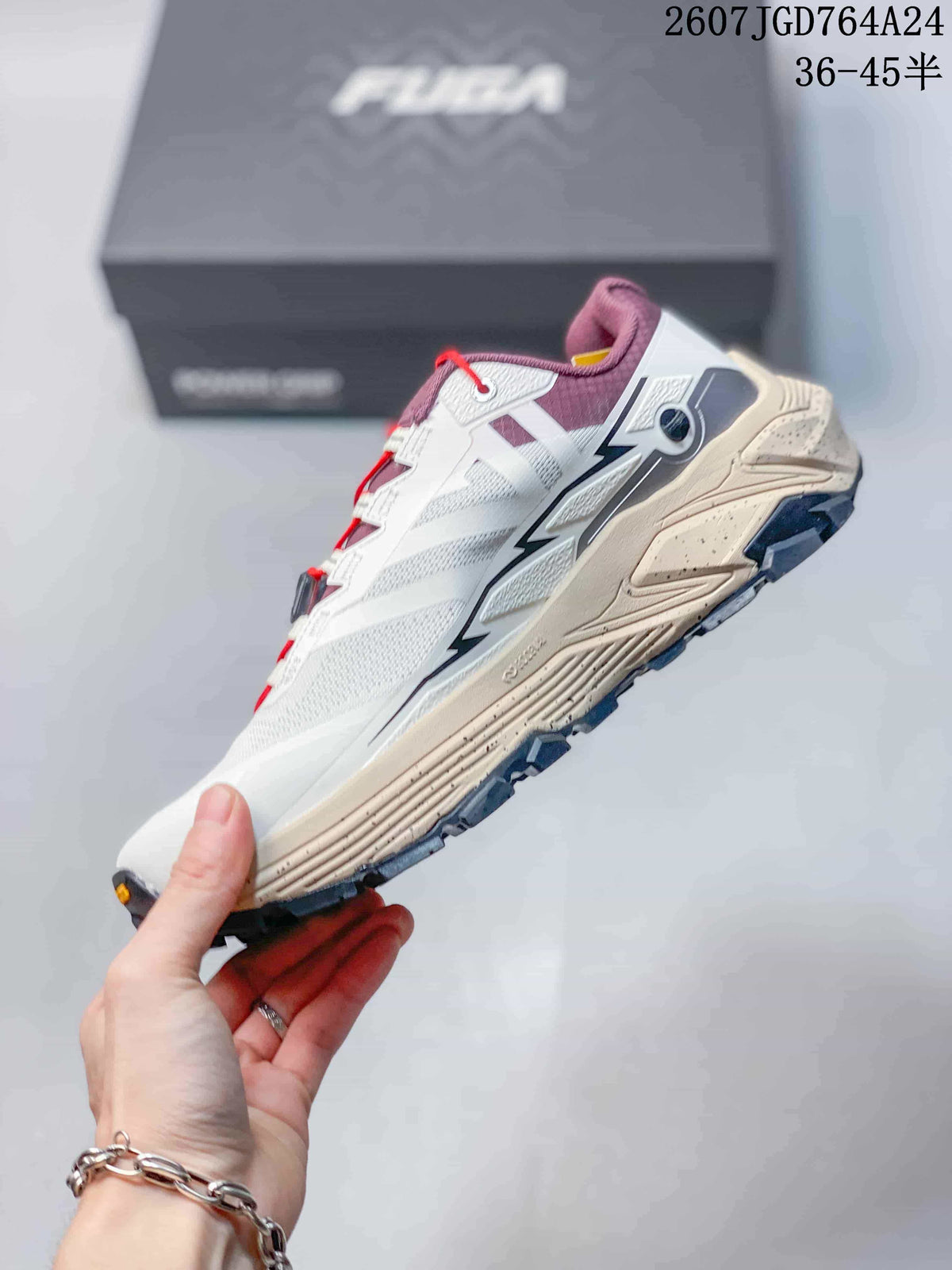 Side profile of the Kailas FUGA EX3 shoe showing the white mesh upper, purple accents, red laces and sculpted midsole.
