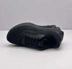 Top view of one black Alo sneaker highlighting the lace panel, textured upper, and tonal branding.