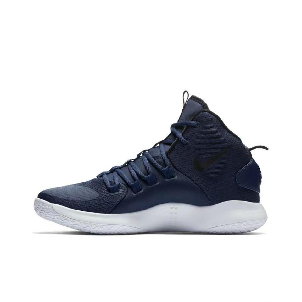 Side view of dark navy high-top Nike basketball sneakers with a white outsole.