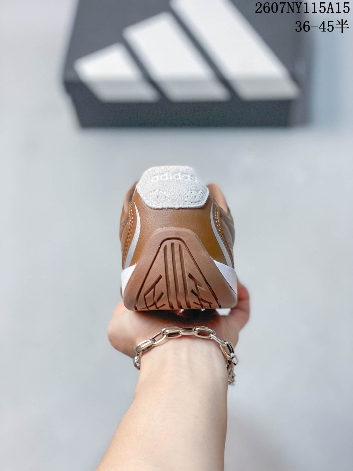 Rear view of the sneaker showing the padded collar, heel detail, and outsole design.