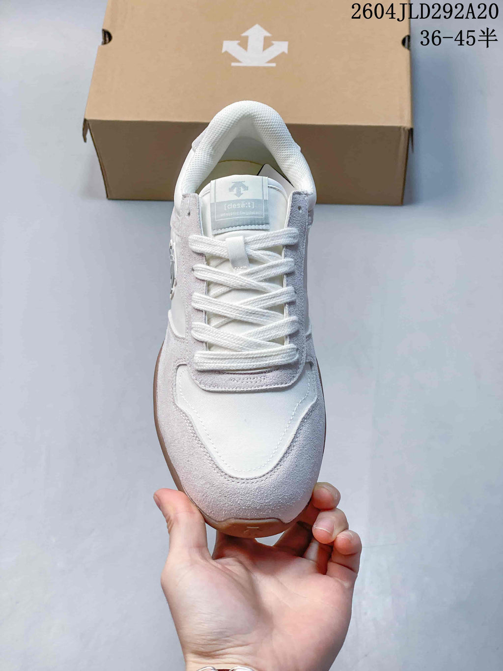 Front view showing the lace-up closure and layered toe panels.