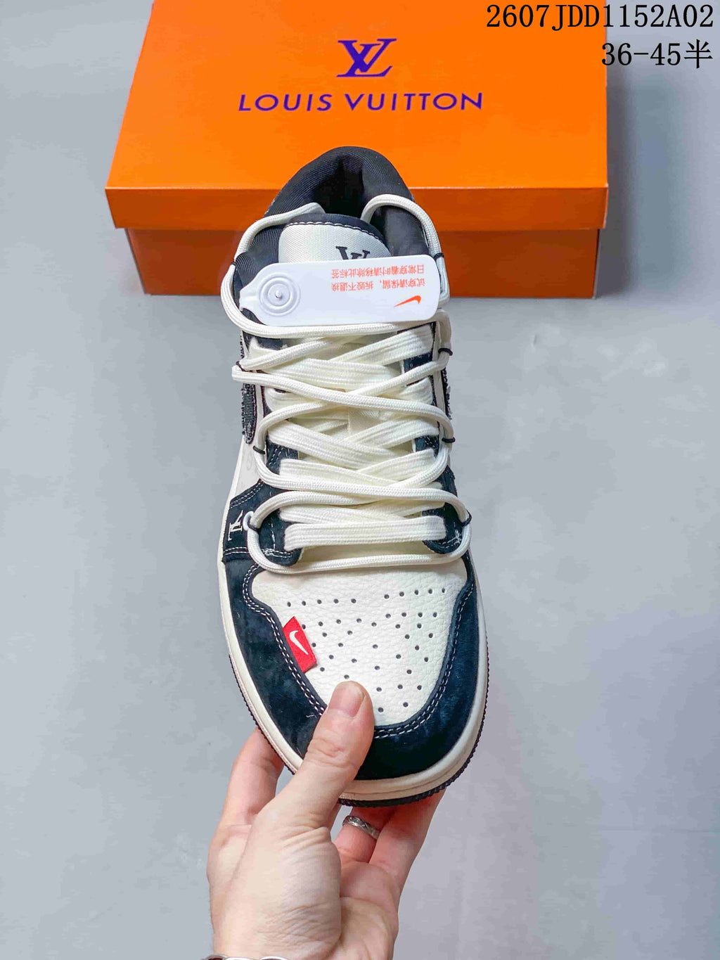 Top view showing perforated toe, white laces, and dark overlays