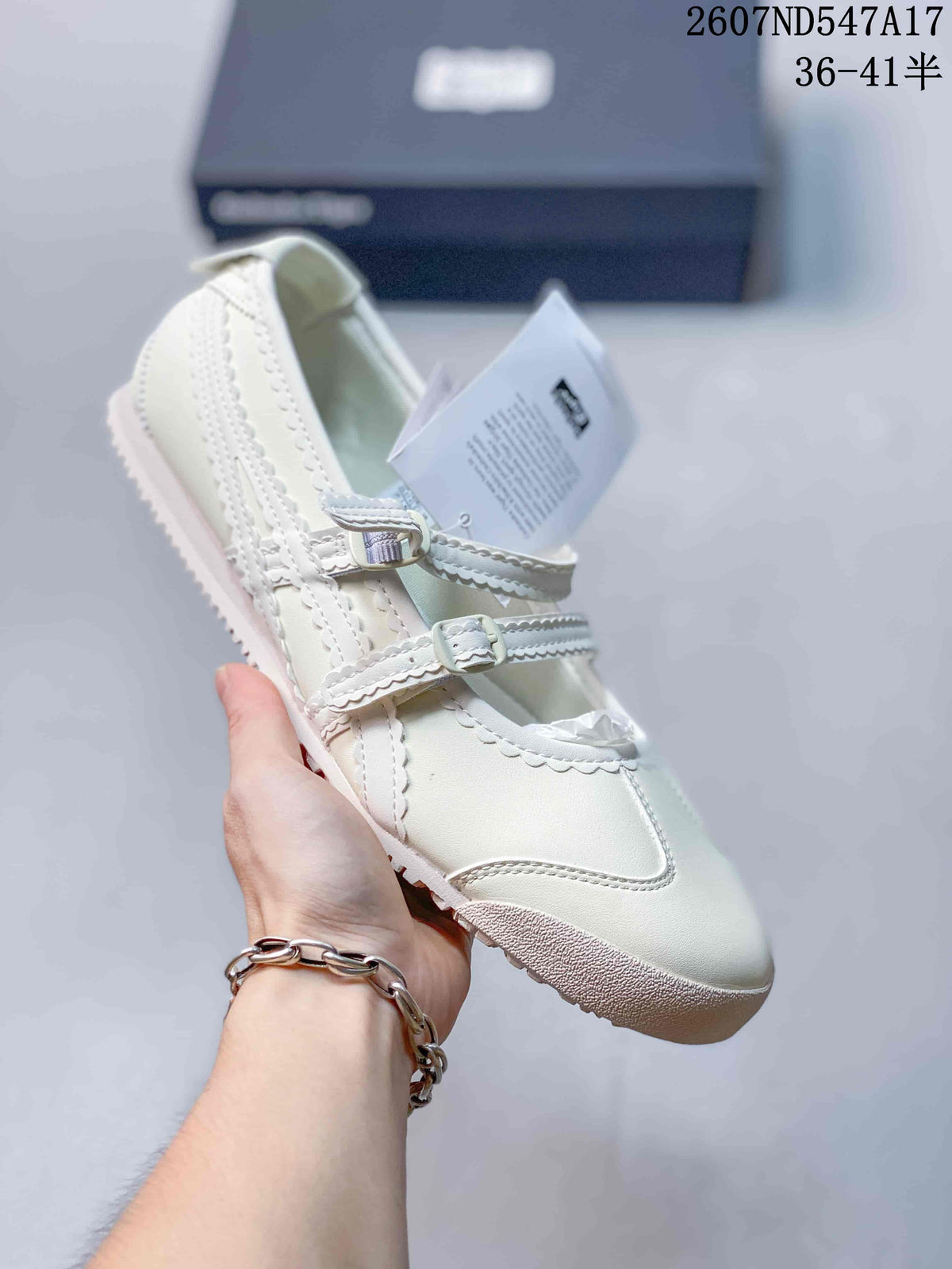 White Mary Jane sneaker with matching white straps, side stripes and a light sole.