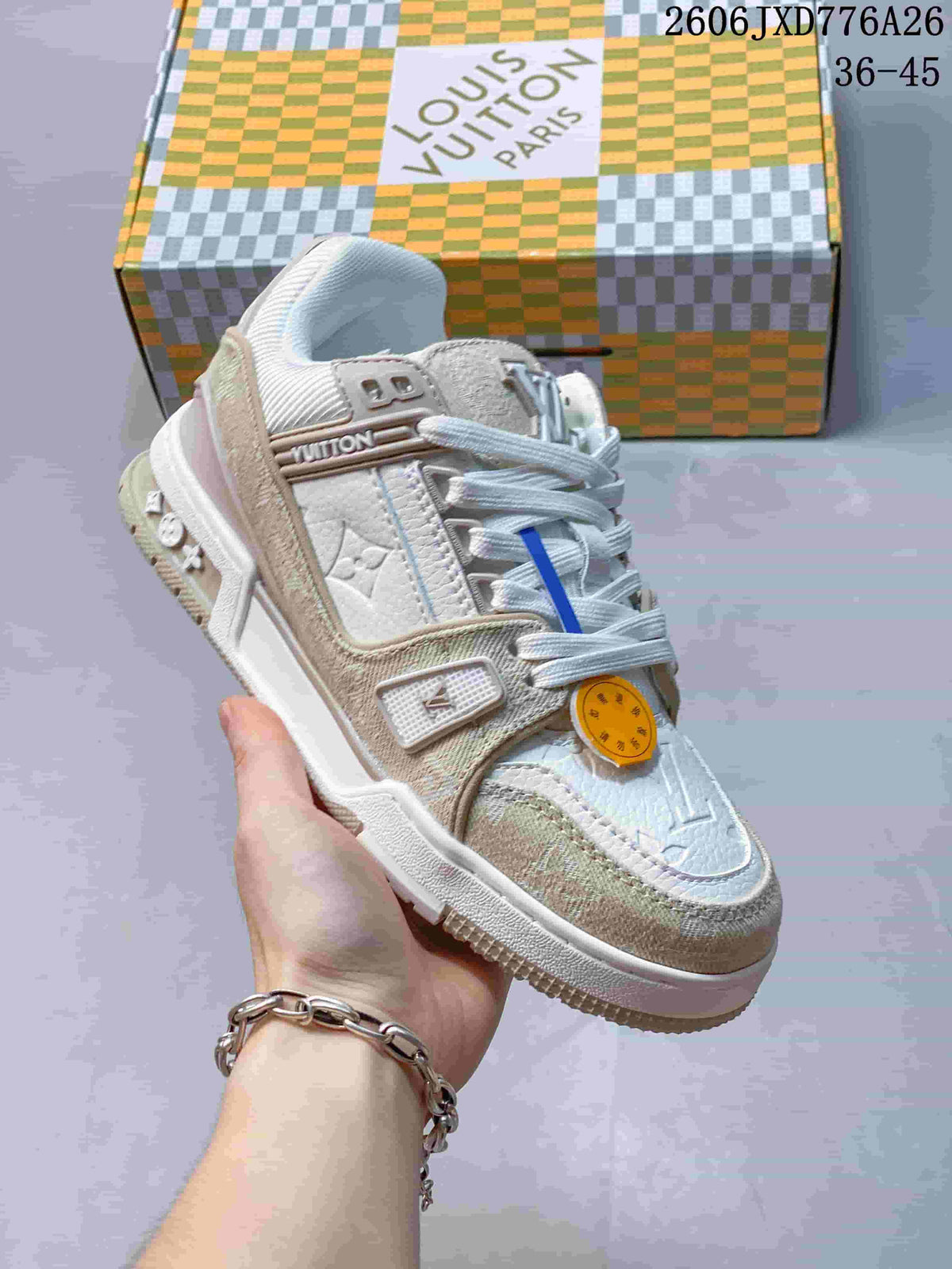 Angled view of a white and beige Louis Vuitton Trainer sneaker