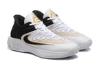 Pair of white Nike Zoom Freak 5 basketball shoes with black and gold detailing
