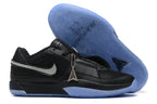 Black Nike Ja 1 basketball shoes with a blue translucent outsole and metallic side detail.