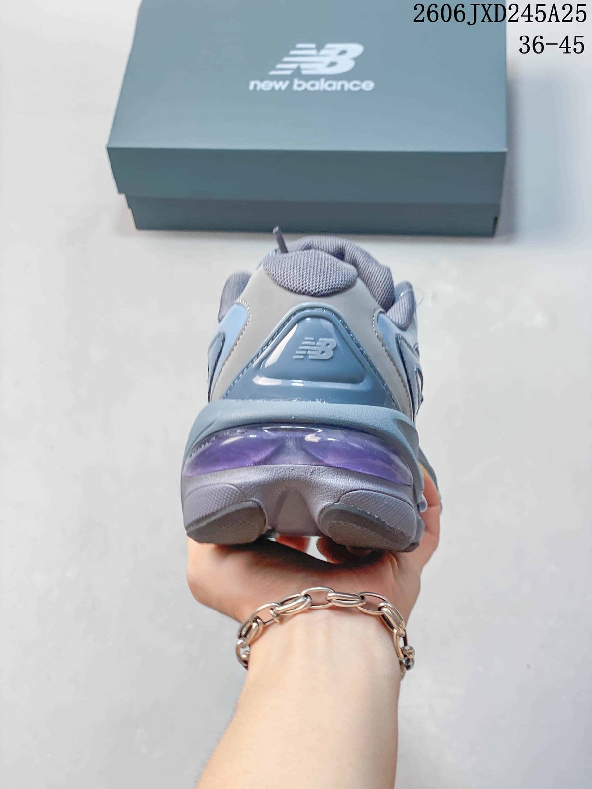 Rear view of a blue and gray sneaker with a purple-toned heel detail