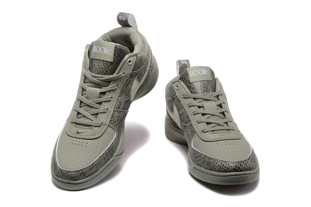 Pair of grey patterned Nike Book 1 sneakers shown from the front