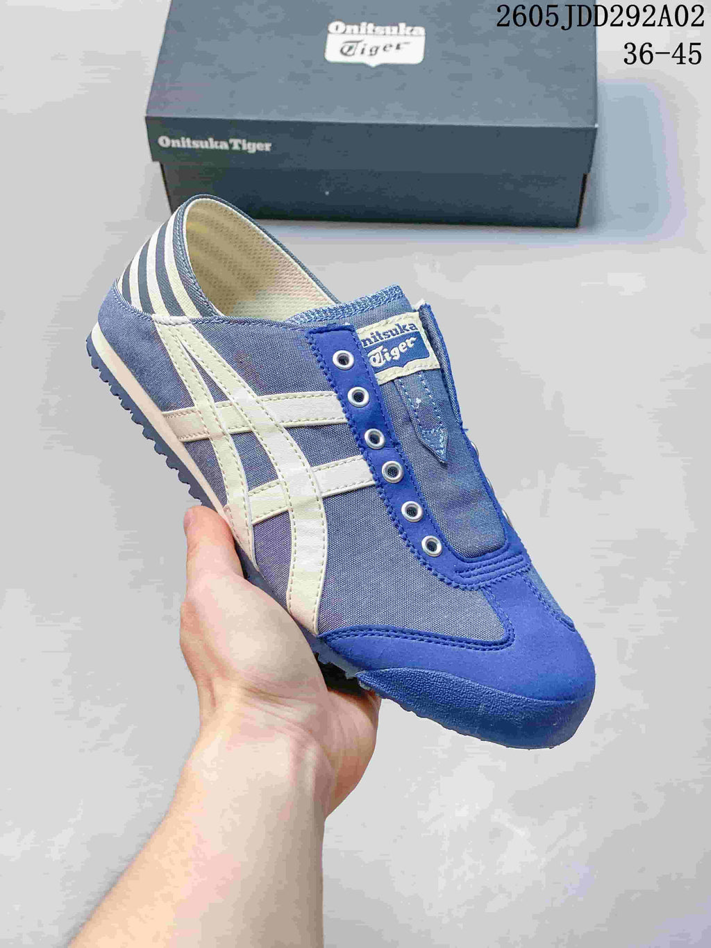 Blue Onitsuka Tiger slip-on sneaker with white side stripes