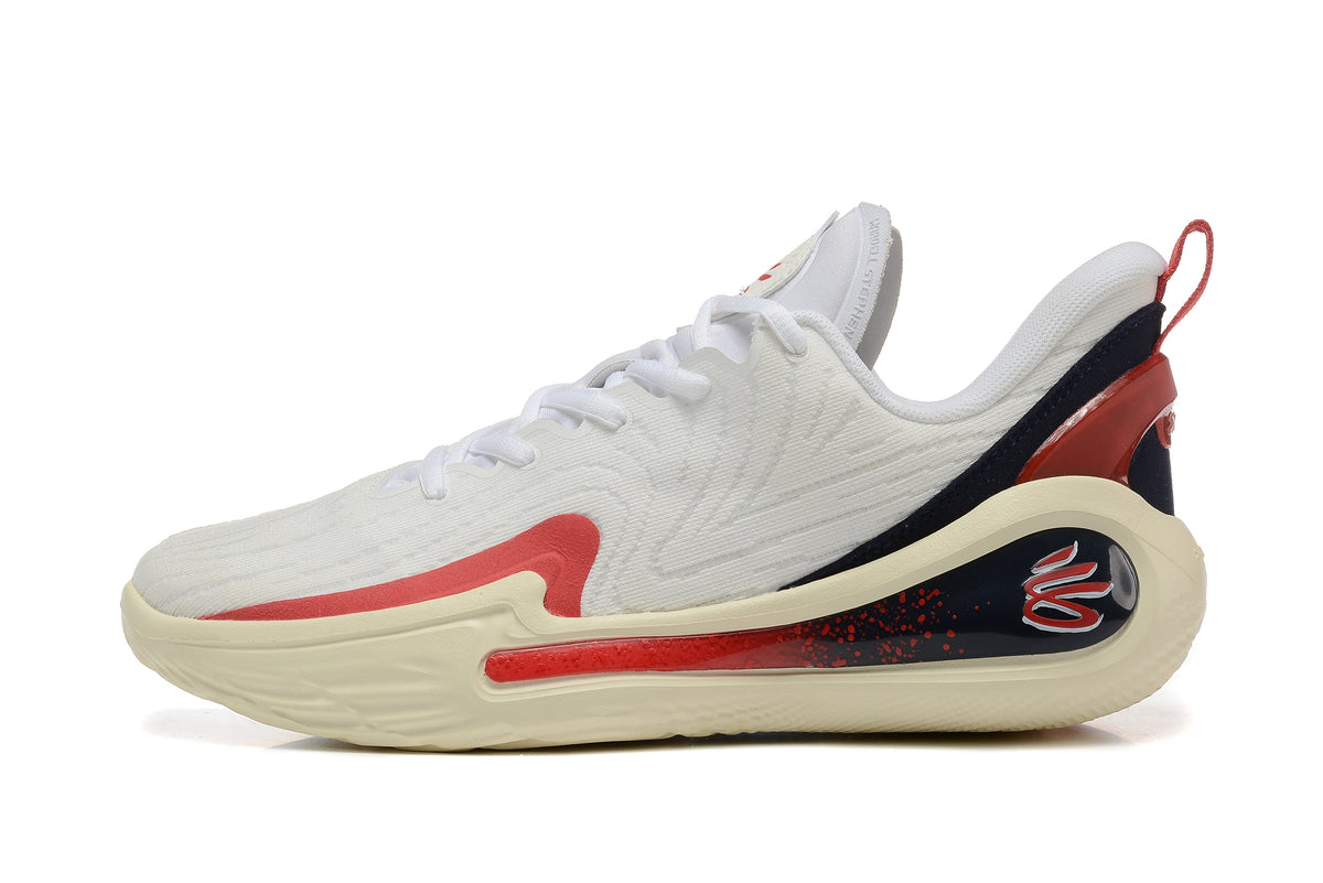 Side profile showing the white upper, red detailing, and dark navy heel accent