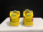 Rear view of the pair showing BAPE STA branding on the heel tabs and red graphic details at the sides.