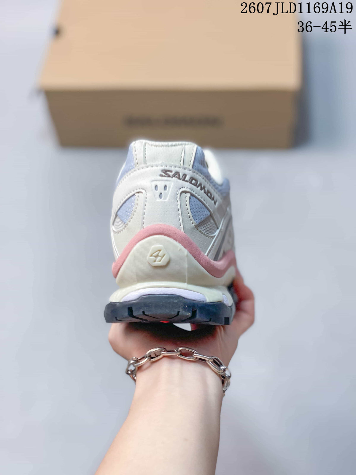 Rear view of a Salomon XT-Quest sneaker showing the padded heel, layered construction and lugged outsole.