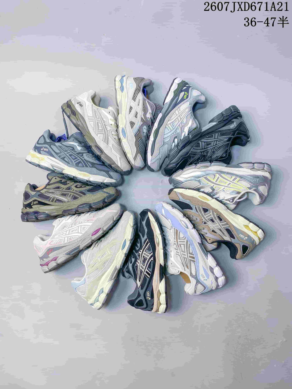 Group display showing multiple ASICS GEL-Kayano 14 color variations.