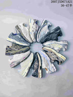 Group display showing multiple ASICS GEL-Kayano 14 color variations.