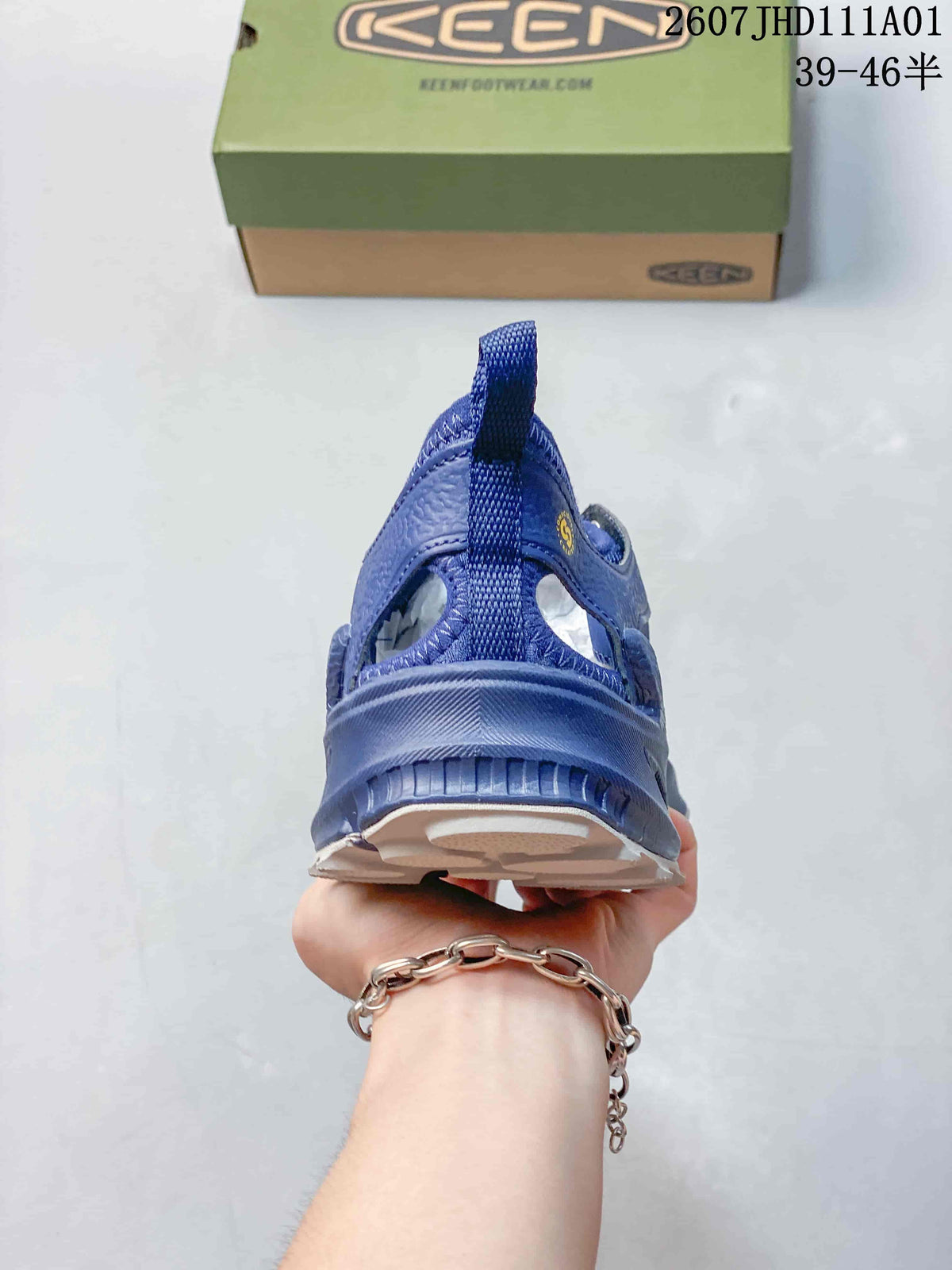 Rear view showing the heel pull tab and open side panels