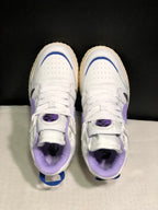 Top-down view showing white laces, perforated toe boxes, lavender lining and purple tongue details.