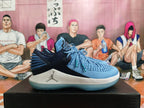 Side profile of a blue and navy Jordan XXX2 basketball shoe