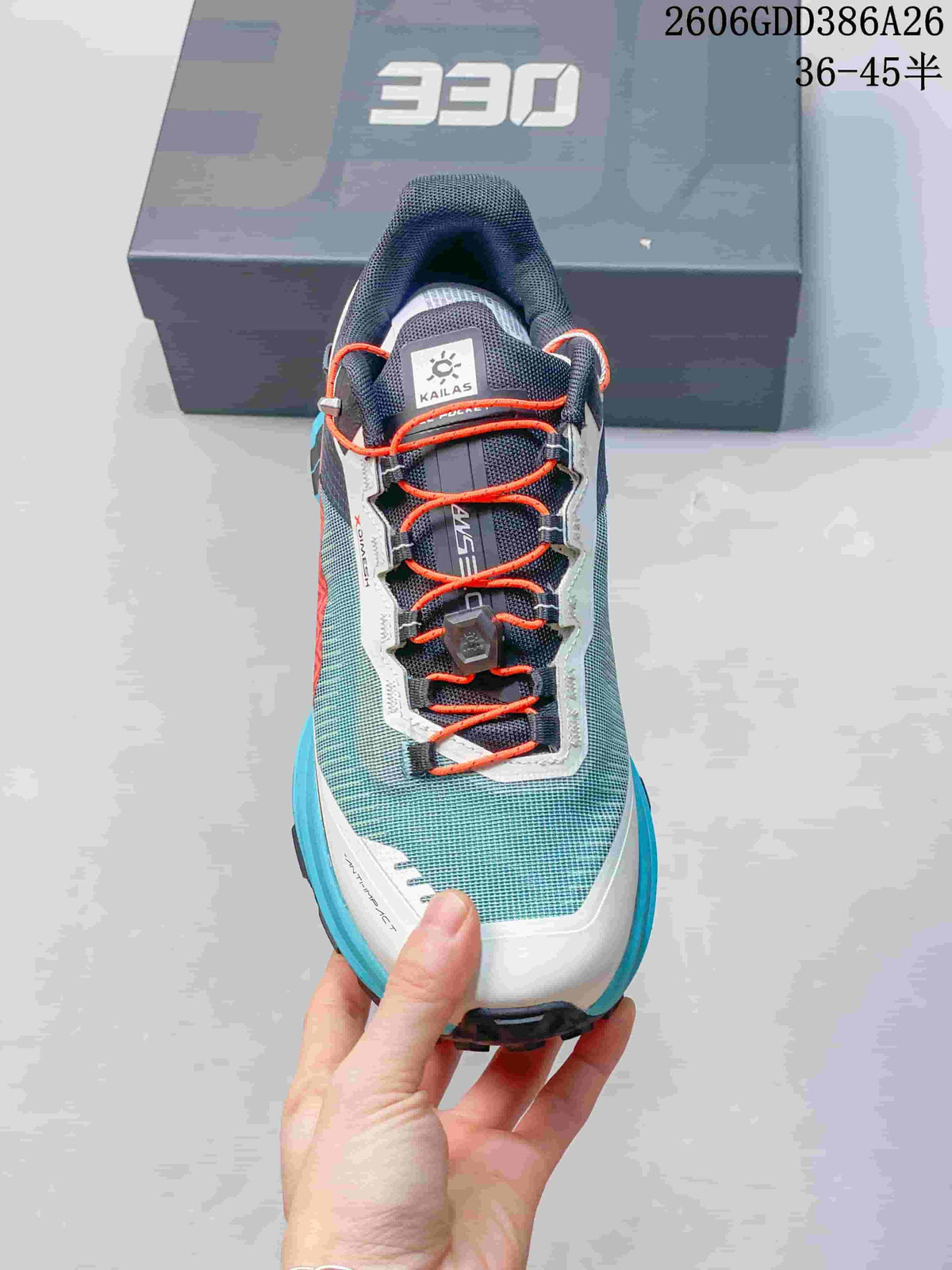 Top view showing the orange laces and turquoise mesh-look upper