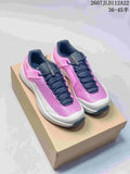 Pair of pink and navy Arc'teryx KOPEC low hiking shoes displayed on a cardboard box; the image also shows the source size range 36–45.5 and code 2607JLD112A22.