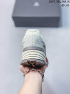 Rear view of the KAILAS hiking shoe showing the padded heel collar, heel branding, layered midsole, and lugged outsole.