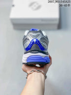 Rear view of the sneaker showing the blue heel accent, layered heel structure and ProGrid branding.