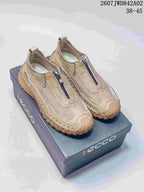 Pair of beige ECCO zip-front mesh-look casual shoes on a branded box.