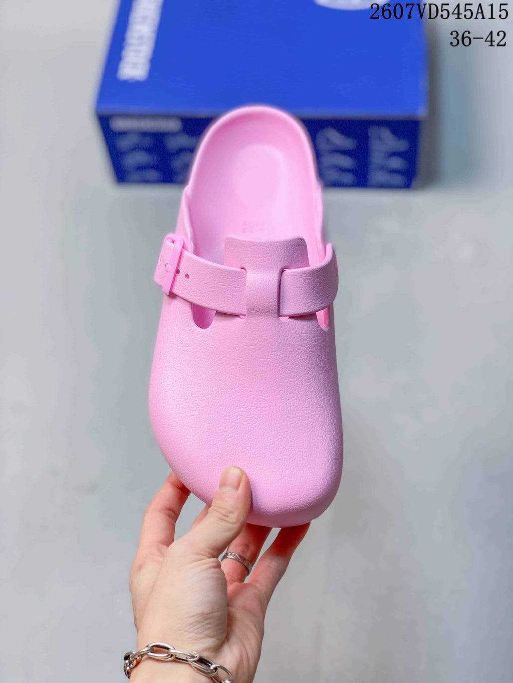 Top view of the pink sandal showing the closed toe, contoured footbed and adjustable strap.