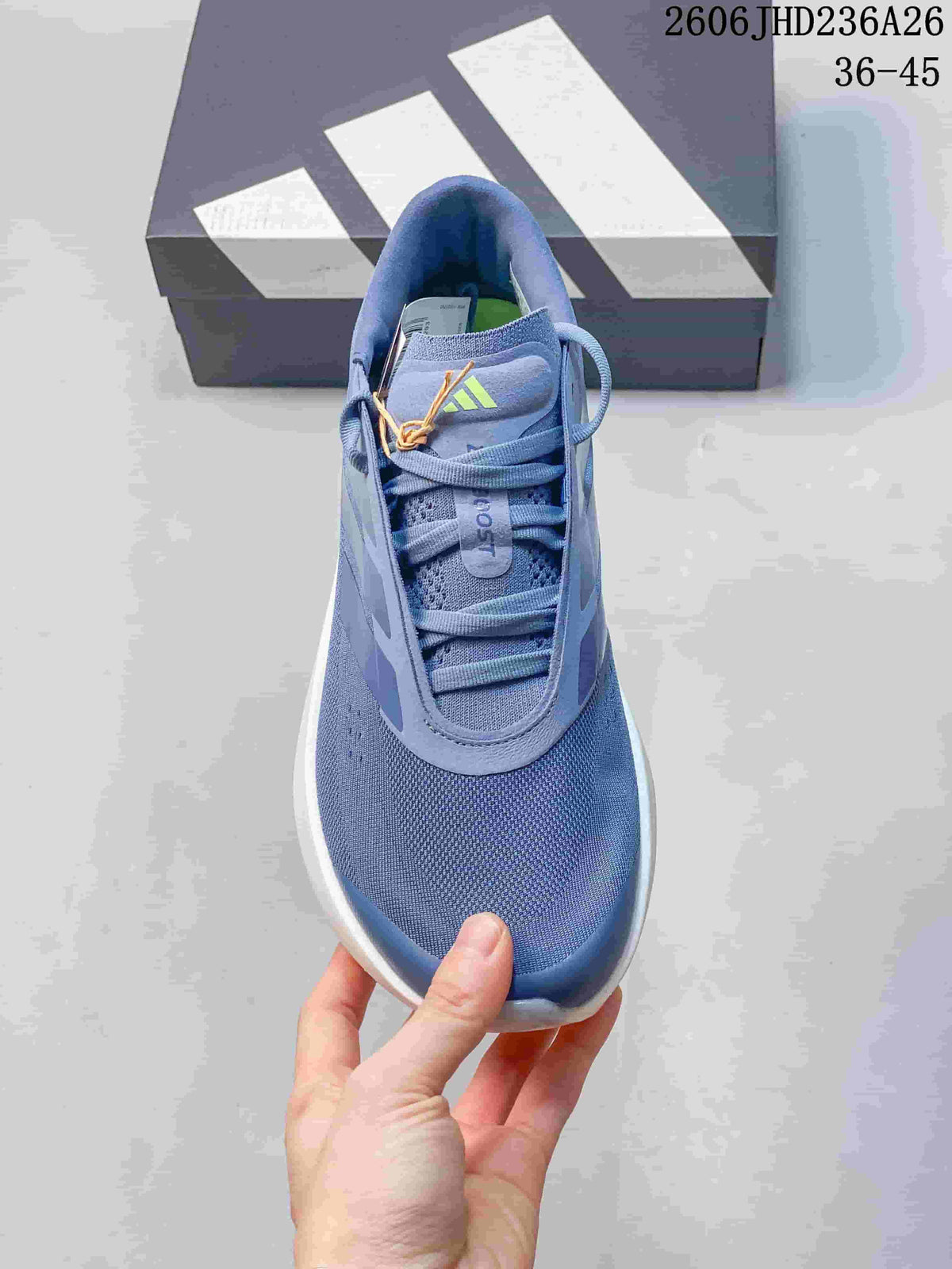 Top view showing the blue shoe's laces, tongue, and textured toe.