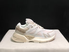 Single side view of the bone white AMIRI MA Runner sneaker with visible heel branding and tonal outsole.