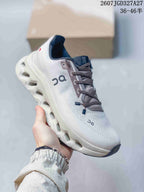 Angled side view of the On sneaker showing the white upper, dark laces, On logo, and sculpted sole.