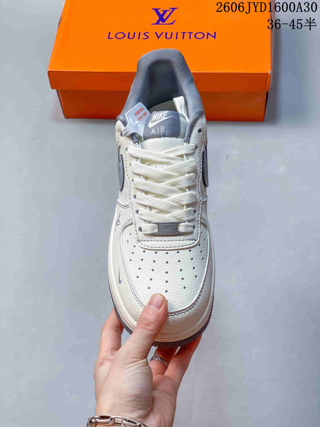 Front view showing the perforated toe, laces, and gray tongue