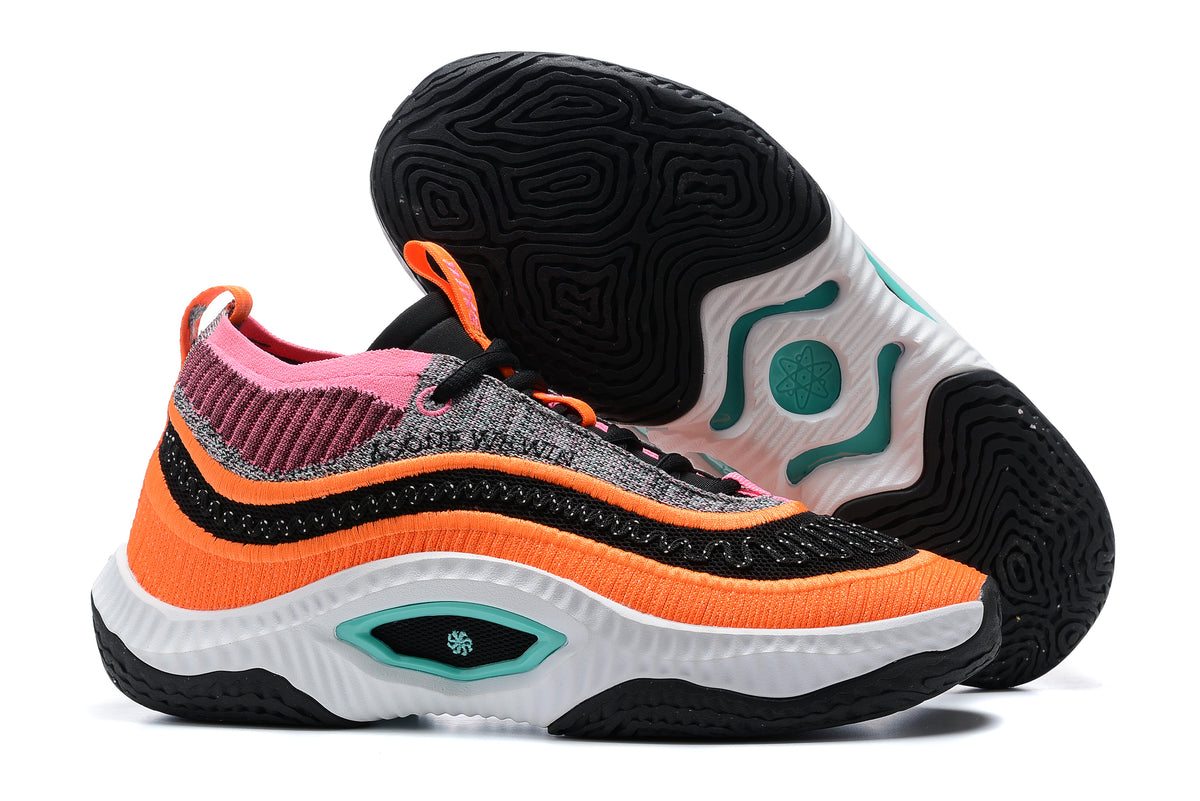 Orange, pink, black, and white Nike Anthony Edwards 3 shoes, with outsole view