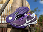 Kobe 8 shoes showing the purple outsole tread and upper.