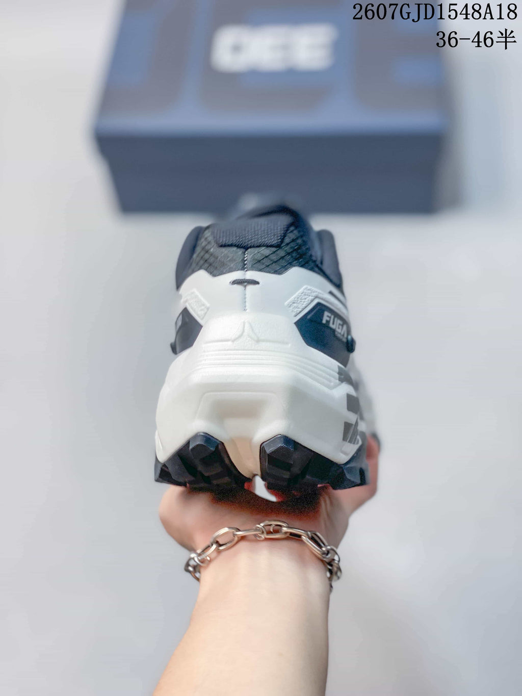 Rear view showing the padded heel, black collar and FUGA branding.