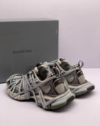 Rear three-quarter view showing the heel pull tabs, padded collars, and contrasting heel panels.
