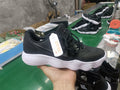 Black Nike HD2017 sneaker with lace-up fastening and a white outsole