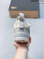 Rear view showing the heel pull tab and layered sole