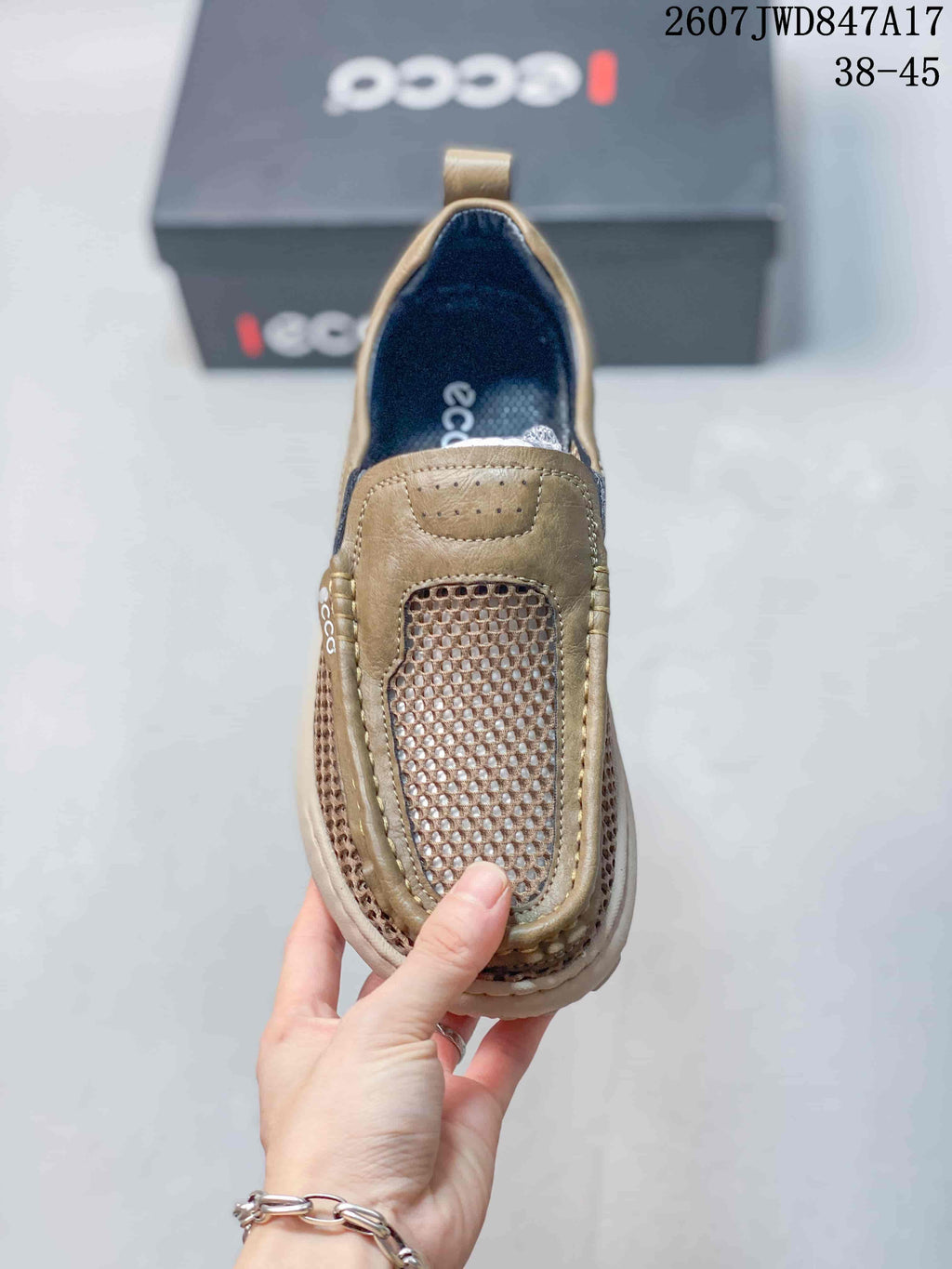 Top view of the sneaker showing the mesh vamp, perforated upper panel, and dark interior lining.