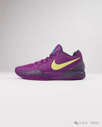 Side view of a purple Nike Ja 1 shoe with a yellow Swoosh