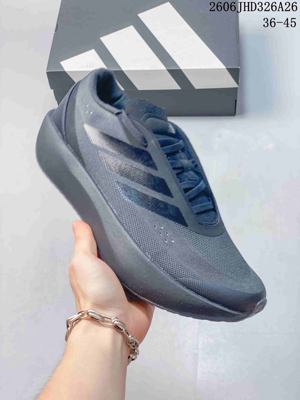 Angled side view of the charcoal running shoe showing its upper and thick sole