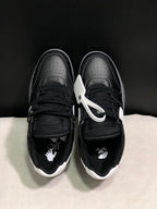 Top view showing black laces, perforated toe boxes, white heel accents, and contrasting insole graphics.