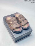 Brown ECCO open-toe sandals displayed on an ECCO shoe box; style code 2607JJD511A21 and size range 39–44 are visible.