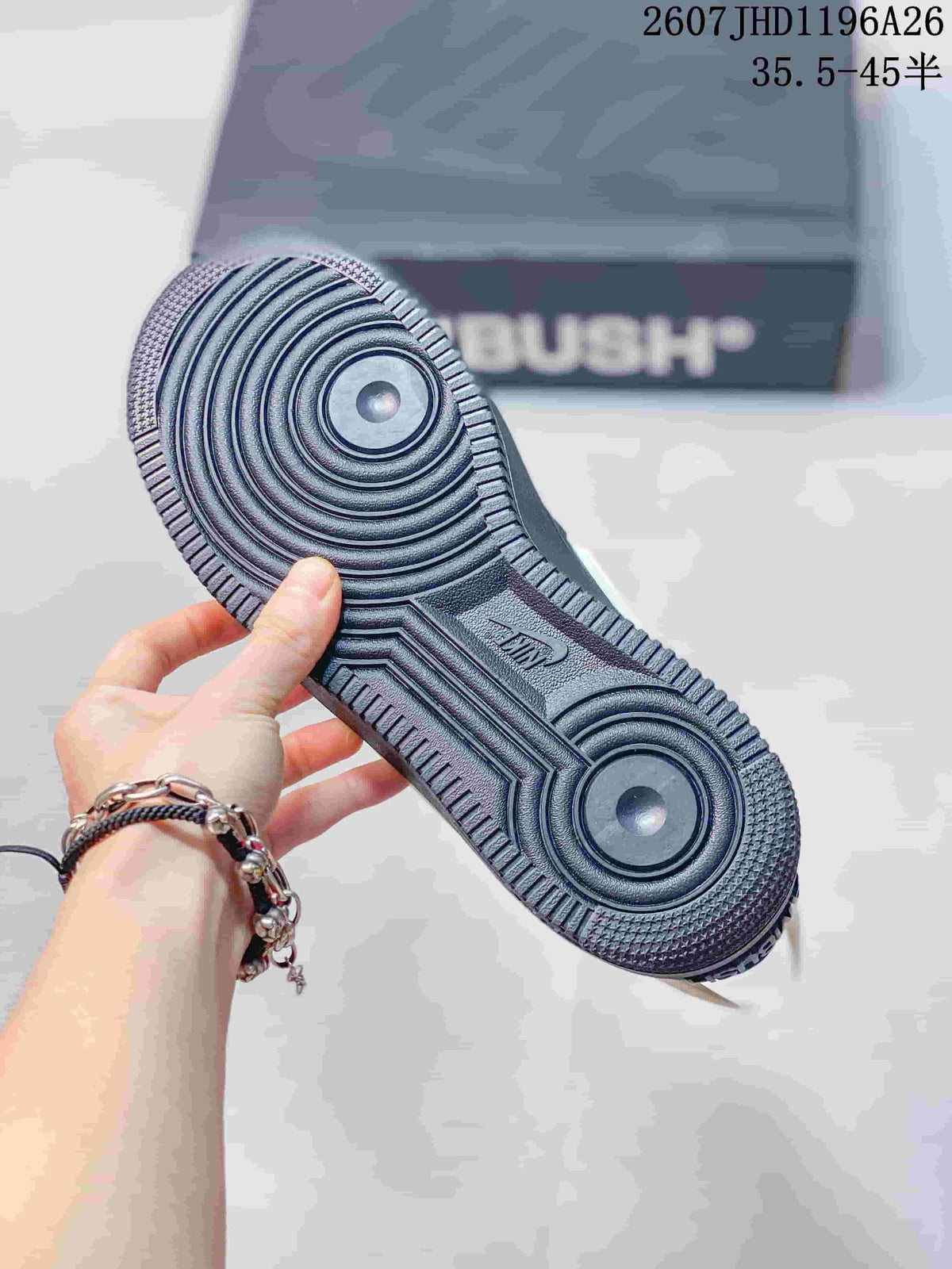 Close-up of the textured black rubber outsole with circular traction patterns.
